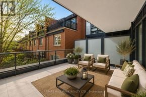 Toronto (Church-Yonge Corridor) condo for rent - A balcony with a table, chairs, and plants.