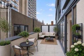 Toronto (Church-Yonge Corridor) condo for rent - A balcony with a table and chairs is shown.
