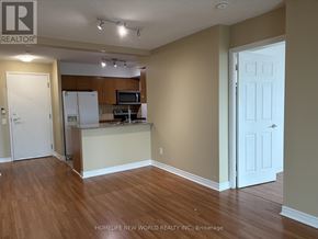 Toronto (Bendale) condo for rent - A kitchen area with a refrigerator, microwave, and oven.