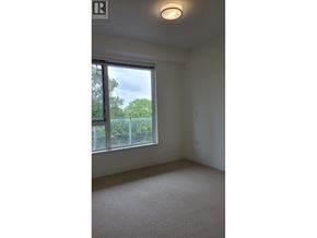 Richmond apartment for rent - A room with a window and a carpeted floor.