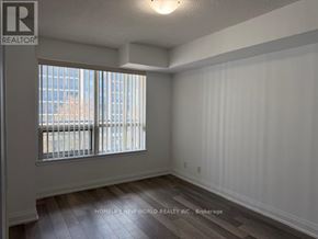 Richmond Hill (Doncrest) condo for rent - A room with a window and a sign that says REALTOR.
