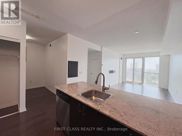 Toronto (Regent Park) condo for rent - A kitchen with a sink and a dishwasher.