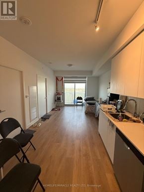 Vaughan (Concord) condo for rent - A realtor photo of a kitchen and living room.