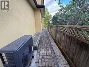 Burnaby apartment for rent - A dining room with a wooden table and chairs.