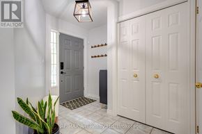 Stratford apartment for rent - A hallway with a grey door and white walls.