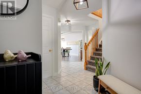 Stratford apartment for rent - A hallway with a staircase and a bench.