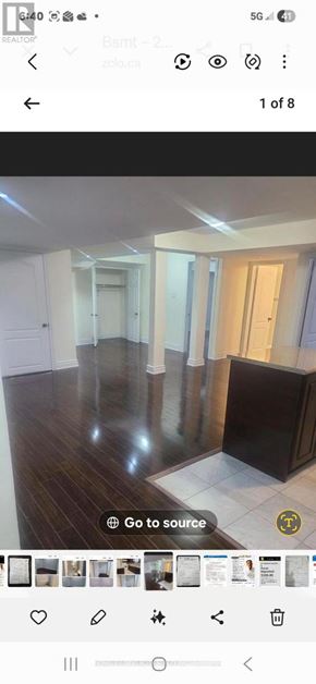 Brampton (Bram East) apartment for rent - A room with wooden floors and white walls.