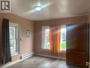 Windsor apartment for rent - A room with a window and curtains.