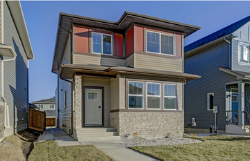 Spruce Grove apartment for rent - A modern house with a grey front yard.