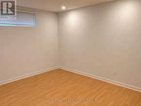London South (South U) apartment for rent - A room with wooden flooring and a window with blinds.
