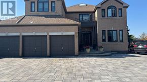 Markham (Milliken Mills East) apartment for rent - A large house with a car parked in front.