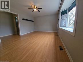 Cambridge apartment for rent - A room with wooden flooring and a ceiling fan.