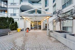 Toronto (Agincourt South-Malvern West) condo for rent - A building entrance with a glass door and a canopy above it.