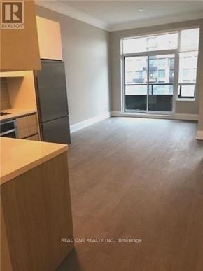 Markham (Unionville) condo for rent - A realtor photo of a kitchen and living room.