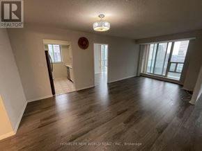 Toronto (Newtonbrook East) condo for rent - A room with wooden flooring and a window overlooking a cityscape.