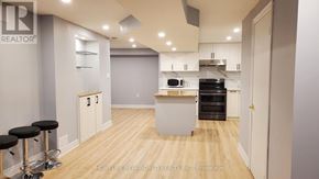 Markham (Cedar Grove) apartment for rent - A kitchen with a bar stool and a counter.