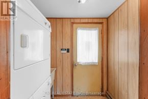 Trent Hills apartment for rent - A small room with a door and a window.
