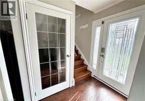 Hamilton apartment for rent - A white door with a glass panel is open.