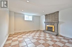 Toronto (Willowdale East) apartment for rent - A room with a fireplace and a checkered floor.