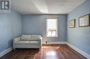 Toronto (Dovercourt-Wallace Emerson-Junction) apartment for rent - A living room with a couch and a window.