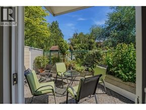 Vancouver apartment for rent - A patio with chairs and a table is shown.