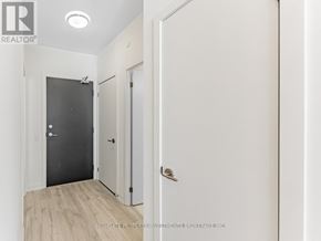 Toronto (Newtonbrook East) condo for rent - A room with a black door and a white door.
