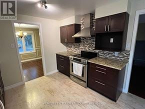 London North (North F) apartment for rent - A kitchen with a black oven and brown cabinets.