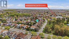 Ottawa apartment for rent - An aerial view of a residential area with a label pointing to Monsignor Paul Baxter School.
