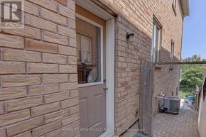 Markham (Cedarwood) apartment for rent - A brick house with a door and window.