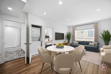 Los Angeles apartment for rent - A modern living room with a dining table and chairs.