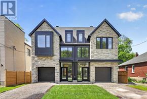 Ottawa apartment for rent - A modern house with a stone facade and large windows is for sale.