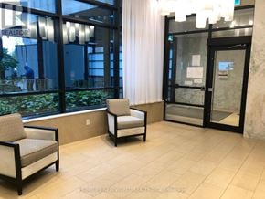 Toronto (Newtonbrook West) condo for rent - A glass door with a sign on it.