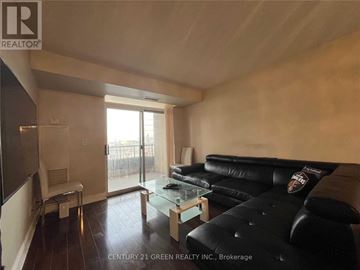 Mississauga (City Centre) condo for rent - A living room with a black couch and a glass coffee table.