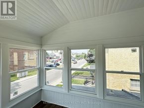 St. Thomas fourplex for rent - A room with a view of the street through the windows.