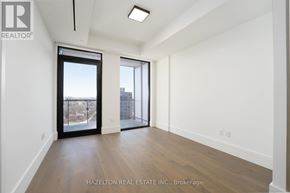 Toronto (Forest Hill South) condo for rent - A room with a large window and a sliding glass door.