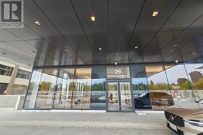 Toronto (Bayview Village) condo for rent - A car dealership with a sign that says Century 21 Kennect Realty Brokerage.