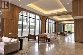 Toronto (Bayview Village) condo for rent - A spacious lobby with a variety of seating options and large windows.
