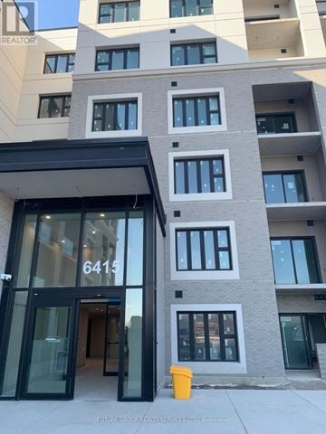 Milton (Wi Willmott) condo for rent - A building with the number 6415 on it.