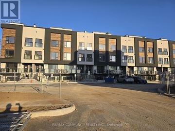 St. Catharines (E. Chester) townhouse for rent - A building with the RE/MAX Community Realty Inc. logo on it.
