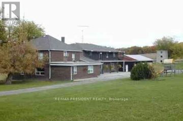 Caledon apartment for rent - A house with a lawn in front of it.