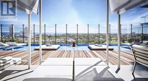 Toronto (Mimico) condo for rent - A pool area with a view of the city.