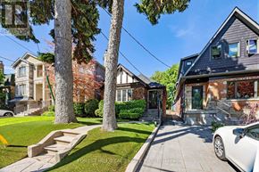 Toronto (Forest Hill North) apartment for rent - A white car is parked on a driveway in front of a house.
