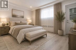 Ottawa apartment for rent - A well-lit bedroom with a large bed, a bench, and a painting on the wall.