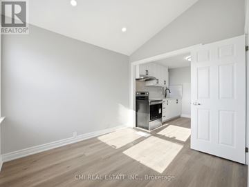 Hamilton (Glenview) apartment for rent - A kitchen with white cabinets and a white door.