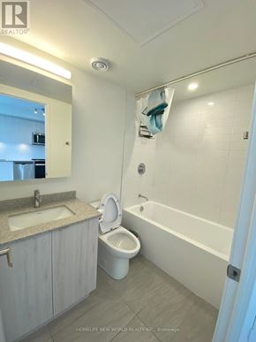 Richmond Hill (South Richvale) condo for rent - A bathroom with a toilet, sink, and bathtub.