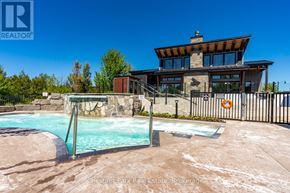 Blue Mountains condo for rent - A large house with a pool in front.