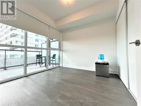 Toronto (Mount Pleasant West) condo for rent - A room with a sliding glass door leading to a balcony.