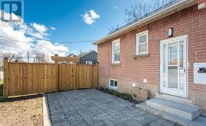 Hamilton (Hill Park) apartment for rent - A living room with a couch, chairs, and a dining table.