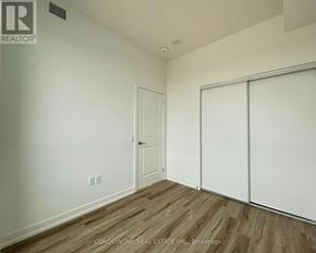 Toronto (Cabbagetown-South St. James Town) condo for rent - A room with a white door and a white closet.