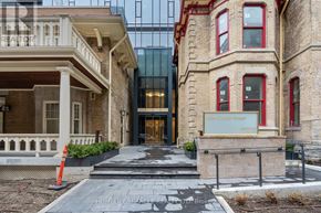 Toronto (Church-Yonge Corridor) condo for rent - The front of a building with a sign that says "Sacramento Street".